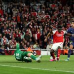 Arsenal's English midfielder #07 Bukayo Saka scores the team's first goal during the UEFA Champions League second-leg semi-final football match between Arsenal and Atletico Madrid at the Emirates Stadium in north London on May 5, 2026. (Photo by Adrian Dennis / AFP)