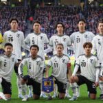 FILE - Japan players pose for a team photo before an international friendly soccer match between Scotland and Japan in Glasgow, Scotland, Saturday, March 28, 2026. (AP Photo/Scott Heppell, File)