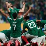 Mexico's Johan Vasquez, top left, celebrates with teammates after Raul Jimenez scored his side's second goal during the World Cup round of 32 soccer match against Ecuador in Mexico City, Tuesday, June 30, 2026. (AP Photo/Ricardo Mazalan)
